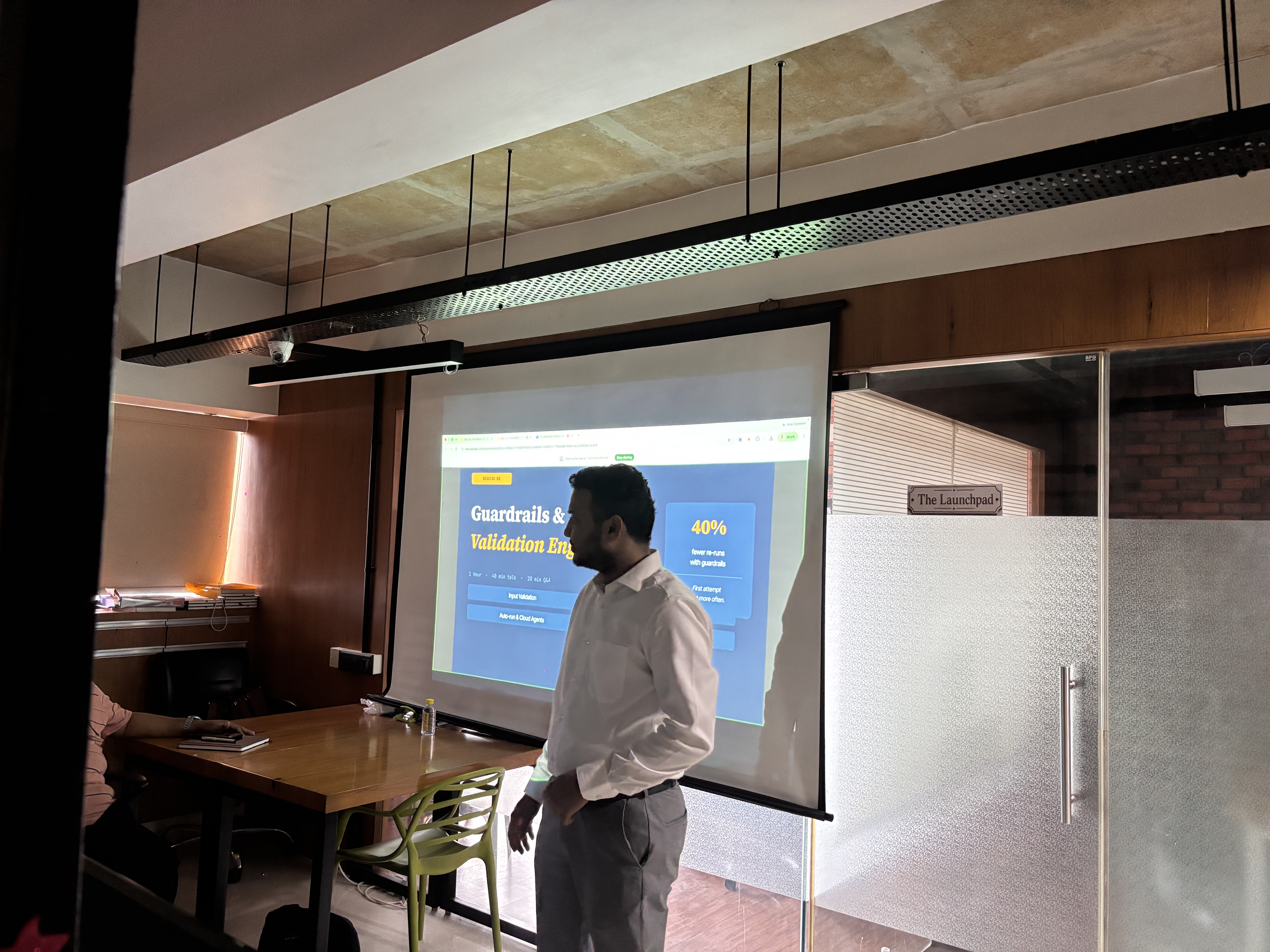 Guardrails and validation session at 200OK Solutions with 40% fewer re-runs slide at The Launchpad, Ahmedabad