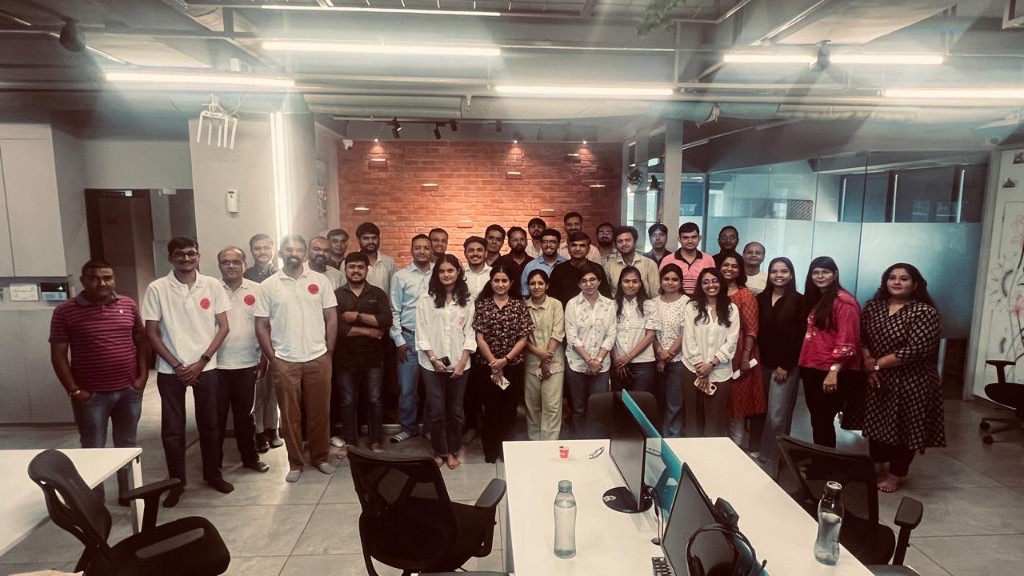 Group photo of SCALETECH team and attendees after the Agile Network India AI Beyond Automation meetup in Ahmedabad
